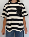 SusyMix - Maglia righe bianca nera con tasca paillettes