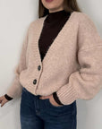 Cardigan coccola rosa