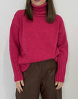 Tensione In - Maglione con coste fuxia