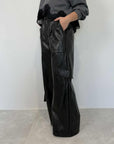 Tensione In - Pantalone similpelle lucida cargo
