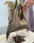 Civico23 - Mezzaluna vera pelle con frange beige