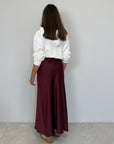 Tensione In - Gonna in satin svasata bordeaux