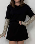 Tensione In - Abito con manicotti in paillettes