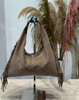 Civico23 - Mezzaluna vera pelle con frange beige