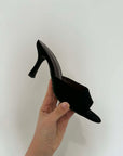 Mules in suede nere