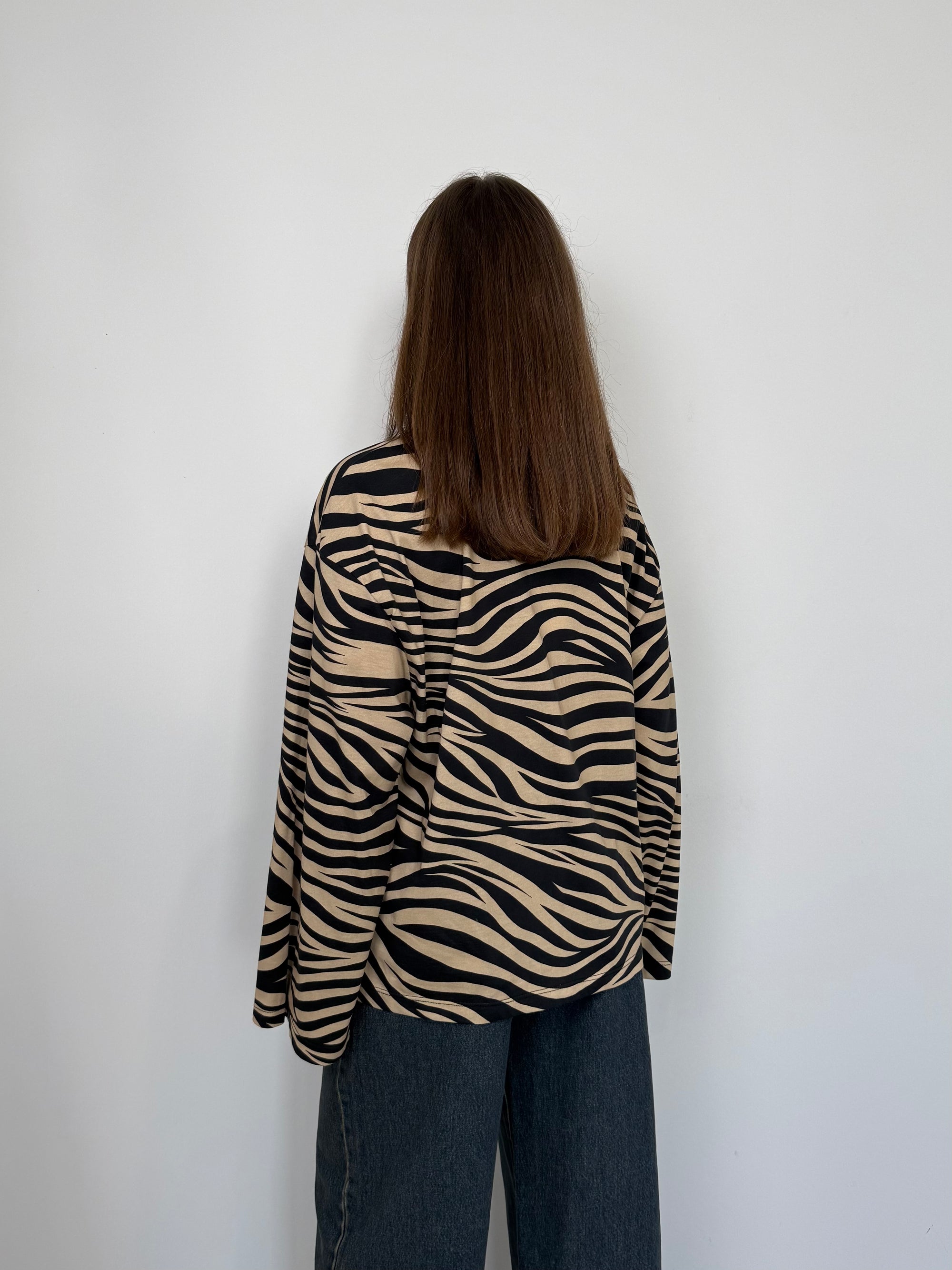 Tensione In - Maglia manica trapezio zebrata