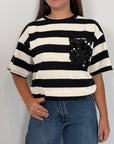 SusyMix - Maglia righe bianca nera con tasca paillettes