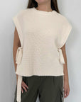 Haveone - Gilet con fiocchi panna