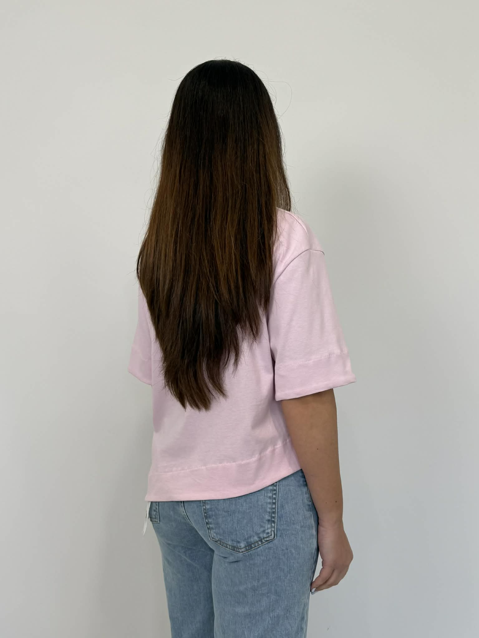 Tensione In - T-shirt con tasca in paillettes asimmetrica rosa